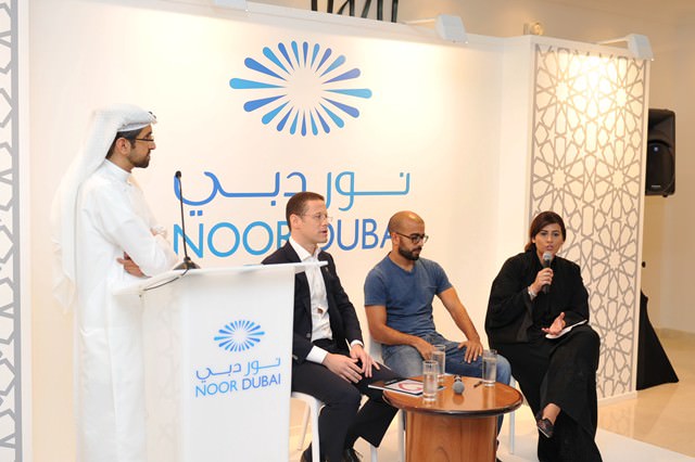 eL Seed (centre) at pre-auction discussion for Noor Dubai on “Supporting humanitarian efforts through art” moderated by author on April 27, 2014.