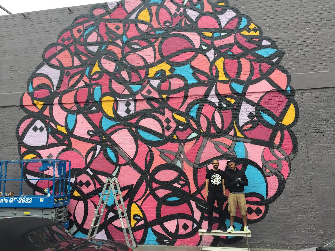 Photo of author with eL Seed & his mural in London’s Shoreditch taken on 12 July 2015. Reads “It is one thing to show a man that he is in an error and another to put him in possession of truth” - John Locke.