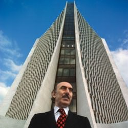 Bisharat in front of the Landmark Tower (built 1973, cost $35 million).